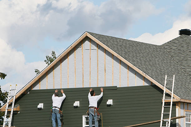 Professional Emergency Siding Repair technician working in Sandusky, OH